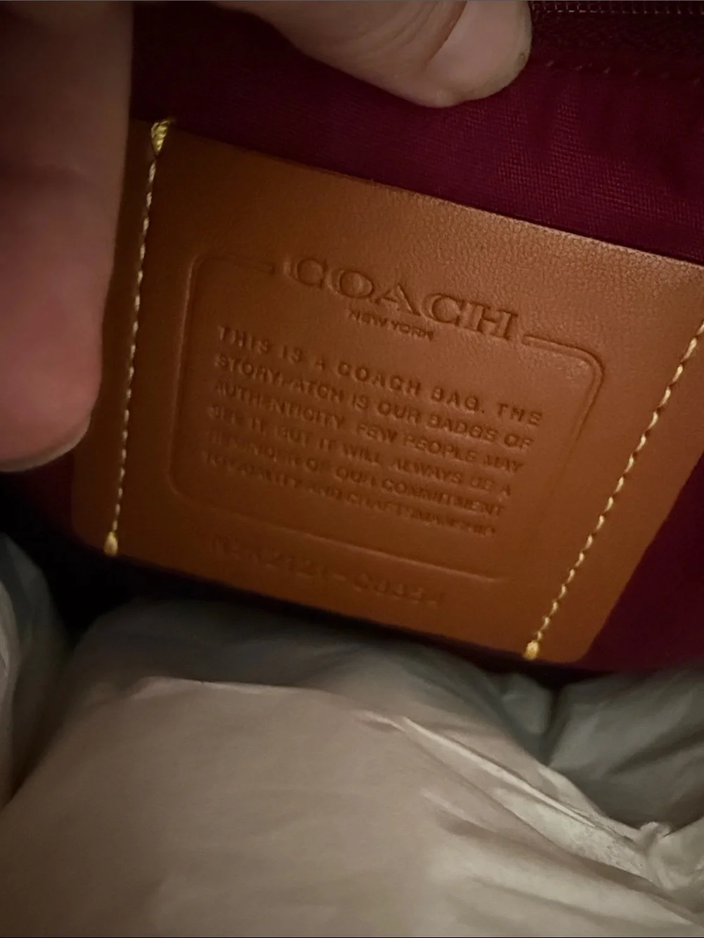 Coach Monogram Canvas Shoulder Bag in Orange.